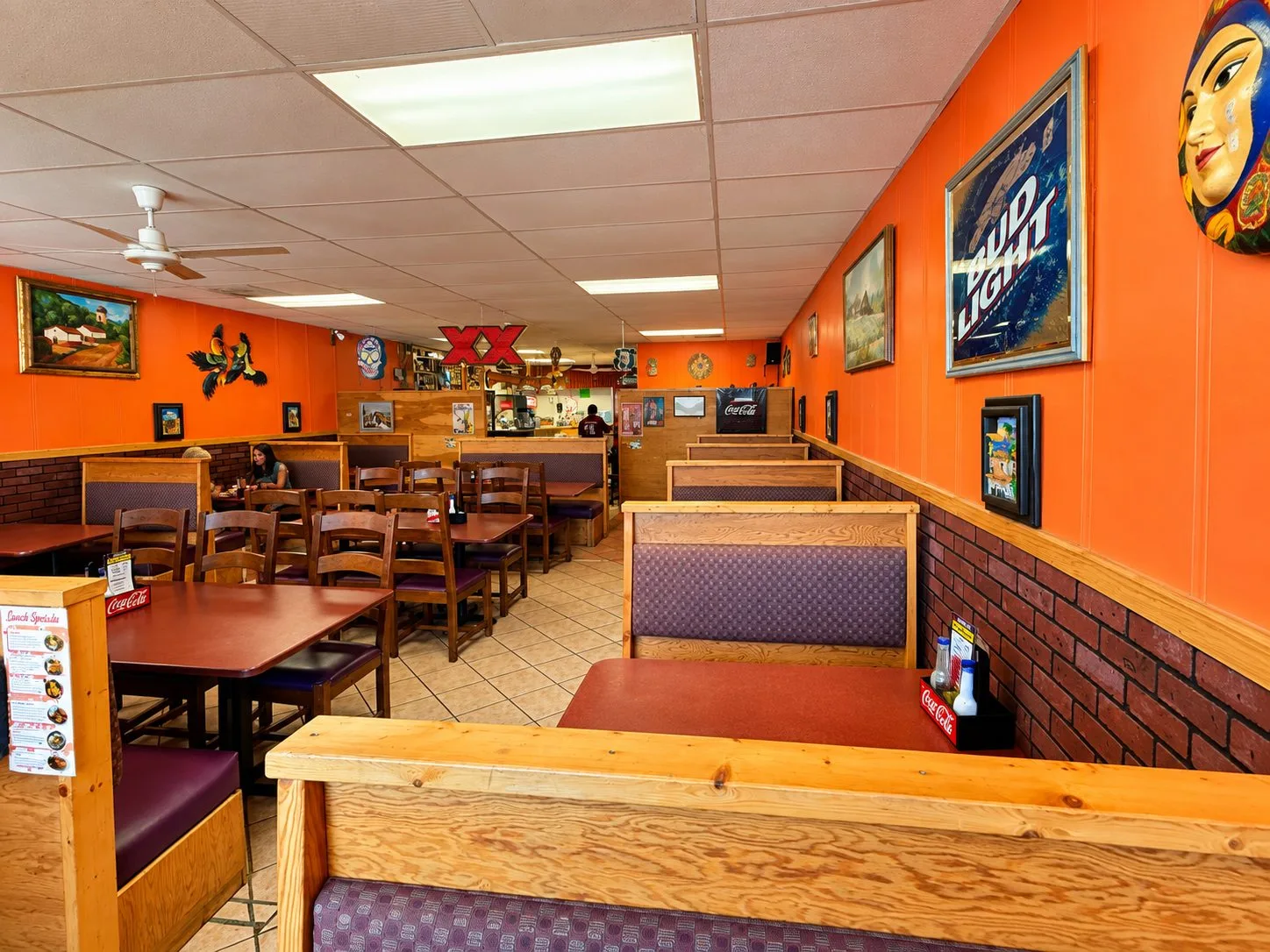 A wide view across the Mariachi Fiesta dining room with booth and table seating